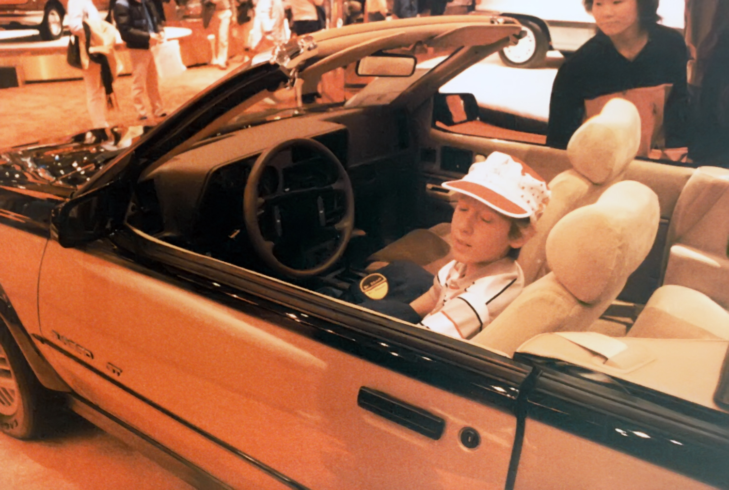 Looks like I'm enjoying the Pontiac Sunbird convertible a bit too much. Hey, I was young and inexperienced!