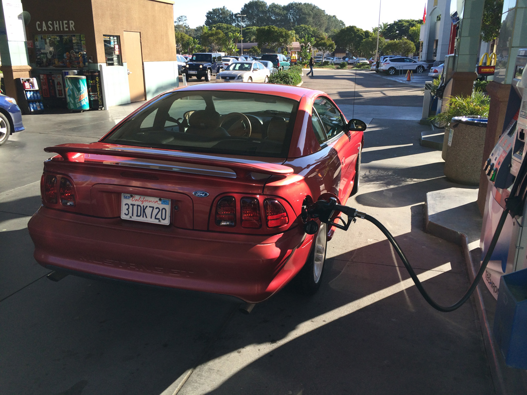 filling the mustang up with gas