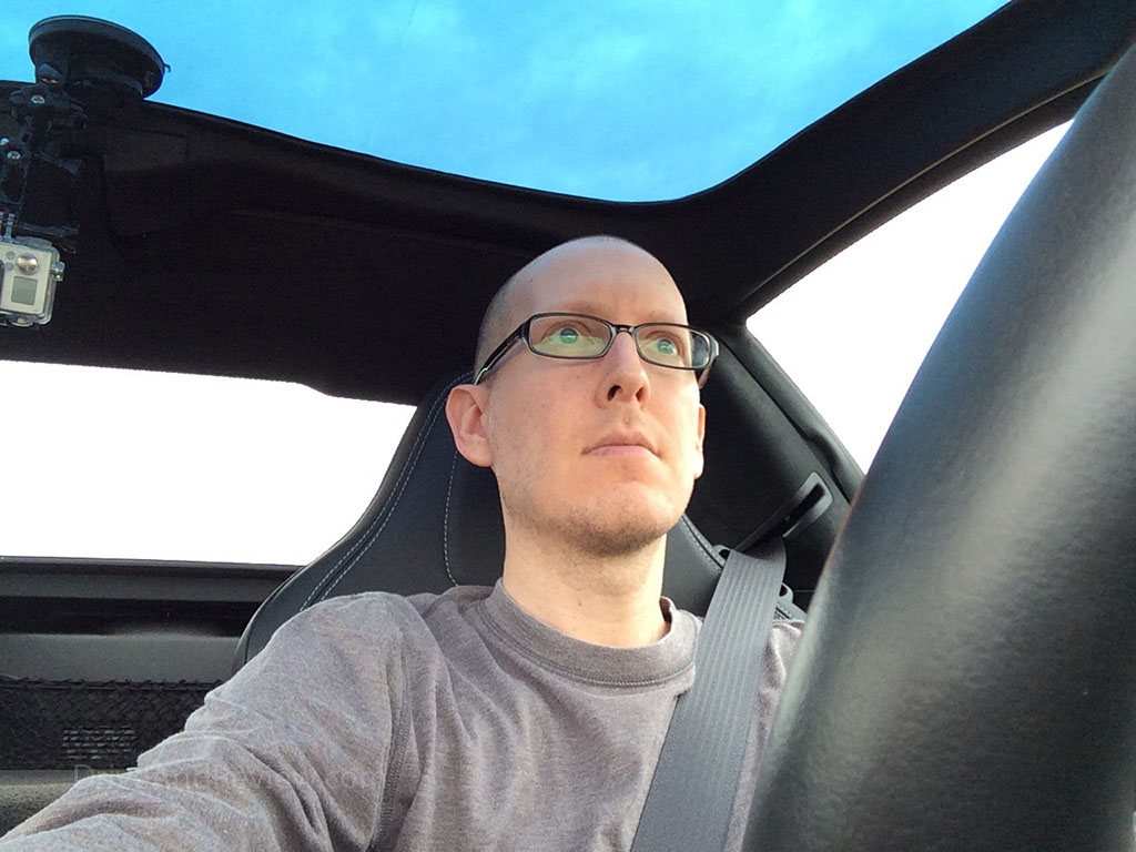 selfie taken while driving a c7 corvette