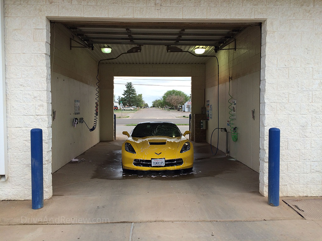 washing the c7 corvette with a foam brush