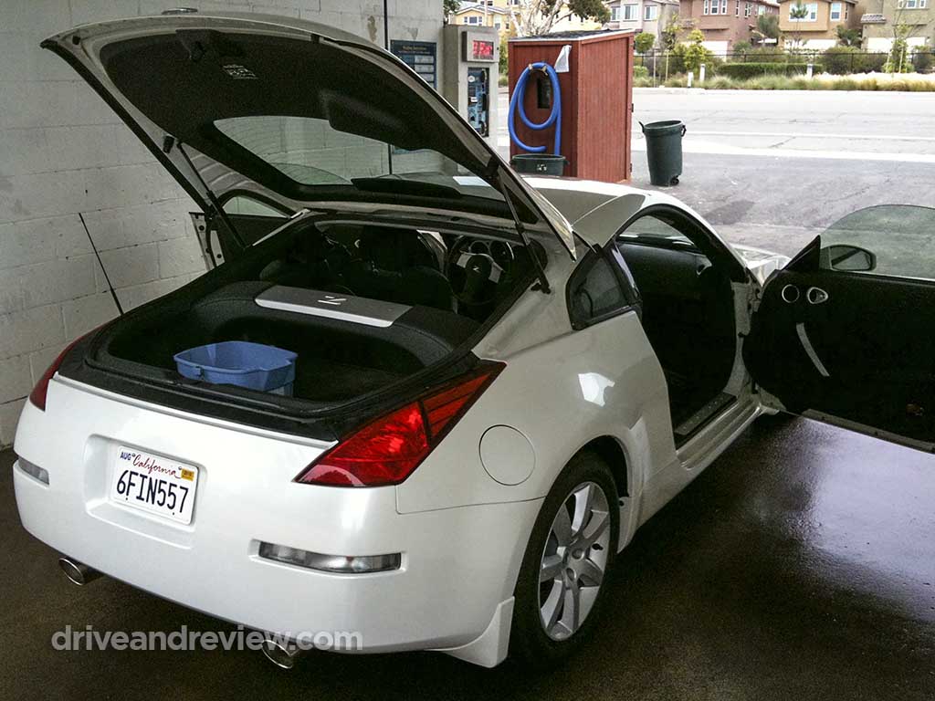 white 2004 nissan 350z all doors open