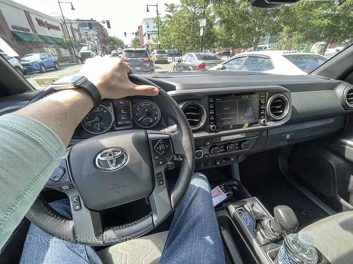 driving a Toyota Tacoma in the city