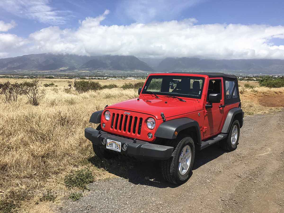 Red rental jeep on Maui