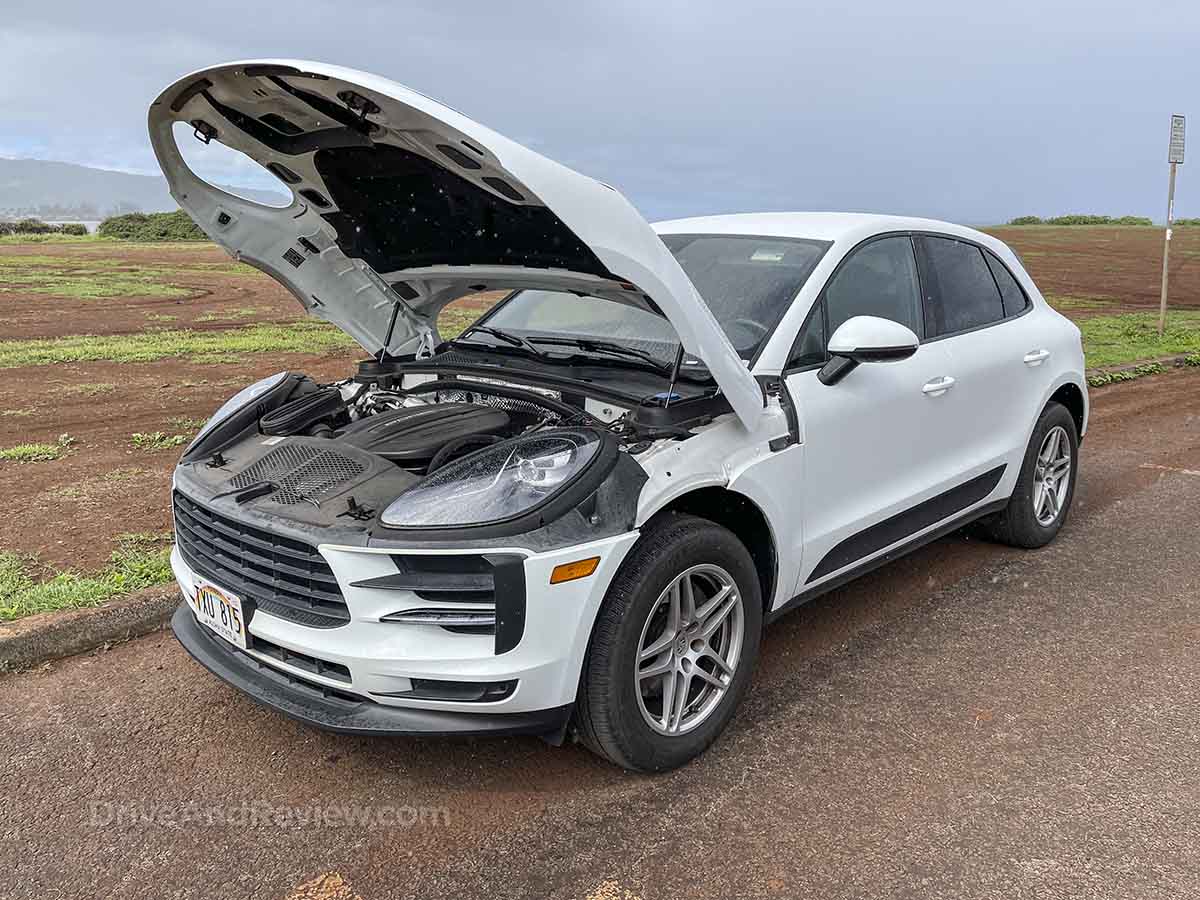 2020 Porsche Macan with hood up showing 2.0 L 4-cylinder engine