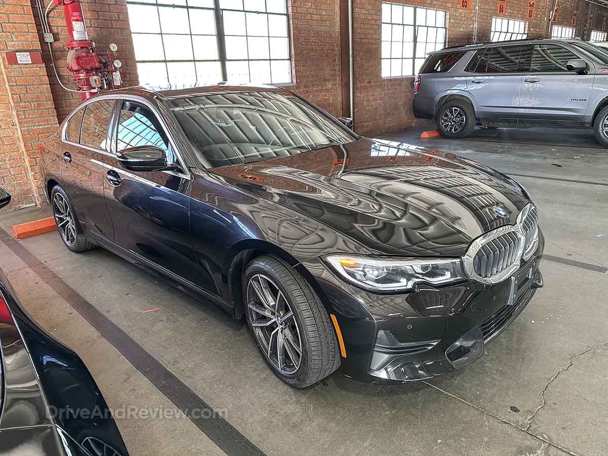 2021 black bmw 330i front 3/4 view