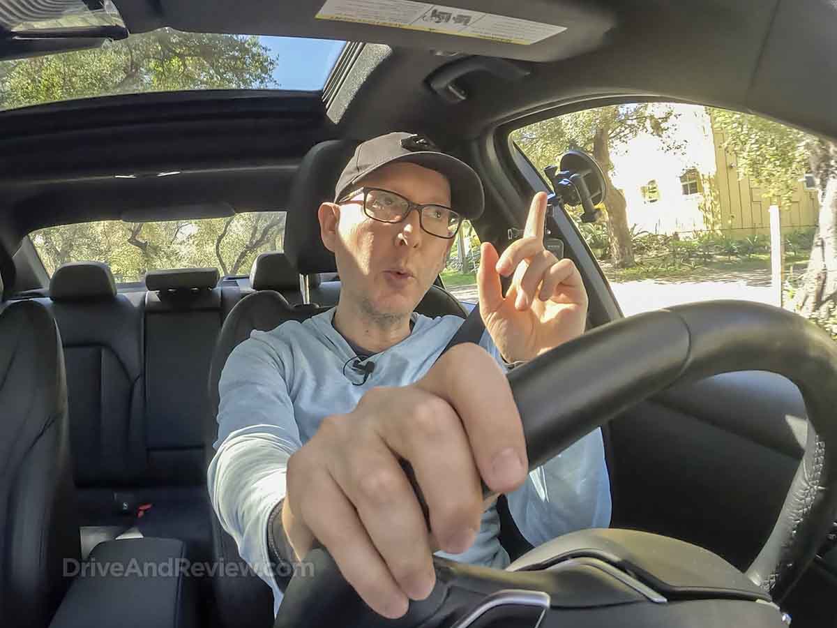 Scott from DriveAndReview.com driving a 2021 BMW 330i