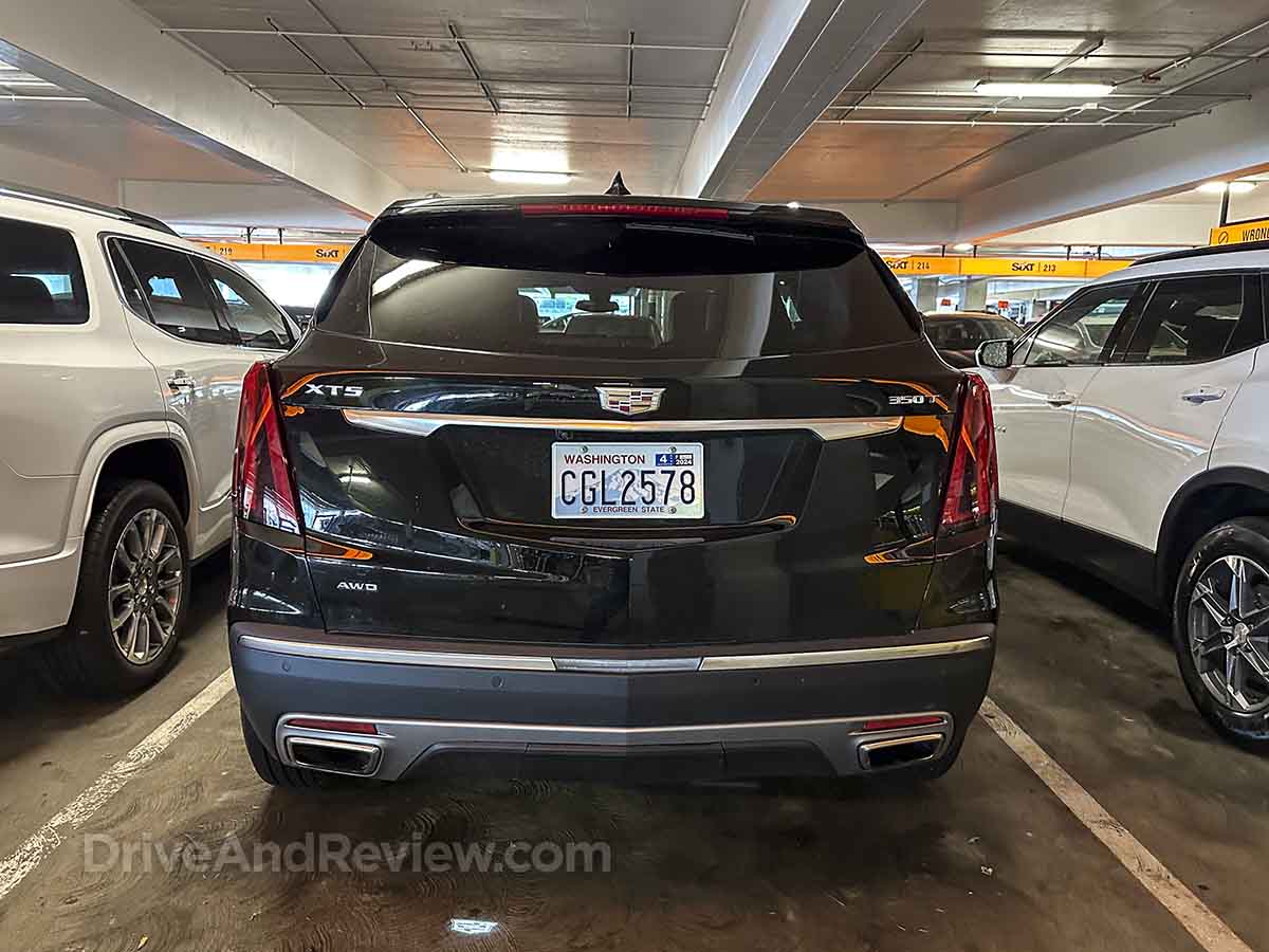 2023 black Cadillac XT5 backed into a parking space