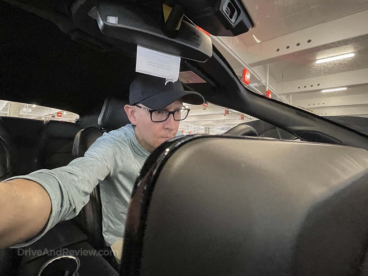 Scott sitting in a 2025 Ford Mustang for the very first time