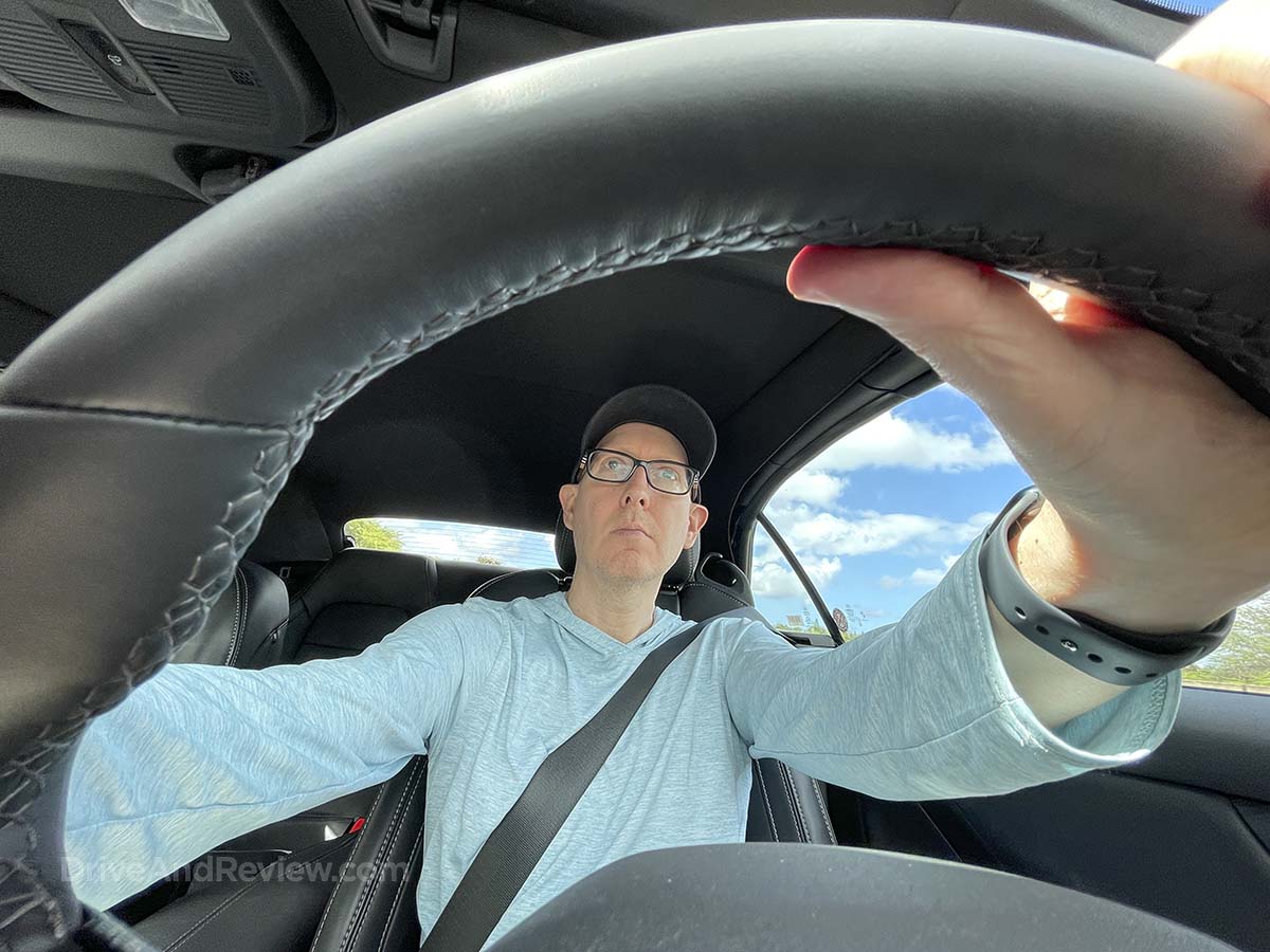 Scott driving a 2025 Ford Mustang convertible
