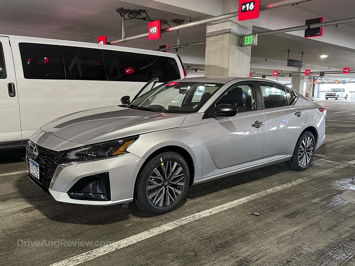 Silver 2026 Nissan Altima parked at the rental car lot