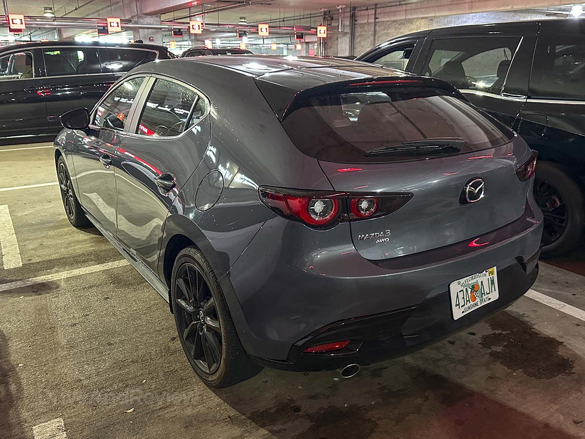 Gray 2026 Mazda 3 rear 3/4 view