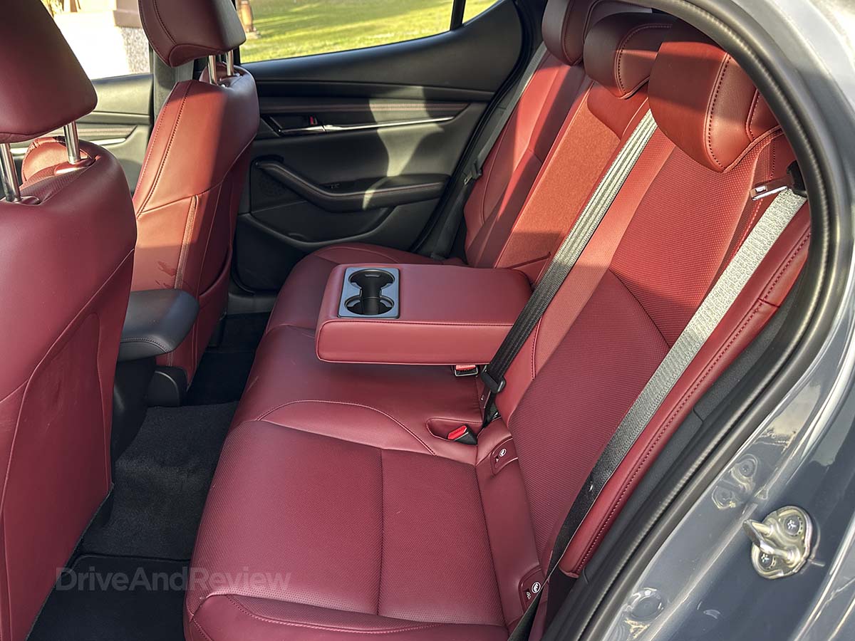 2026 Mazda 3 back seats with flip down armrest featuring cupholders