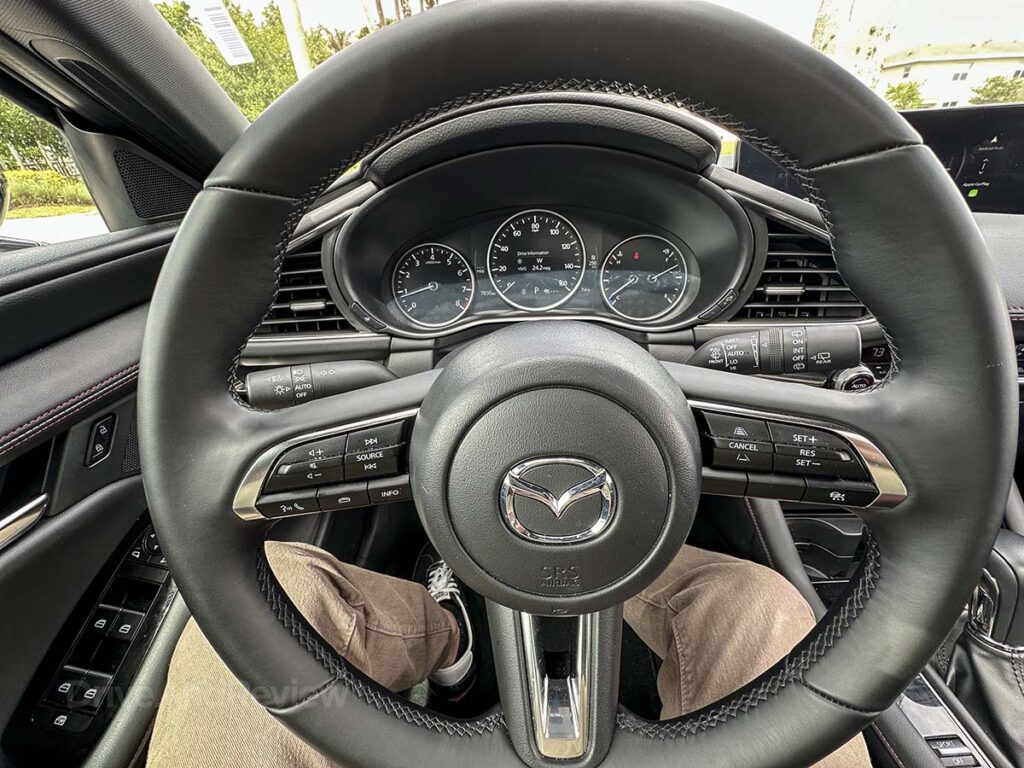 2026 Mazda 3 steering wheel and gauge cluster