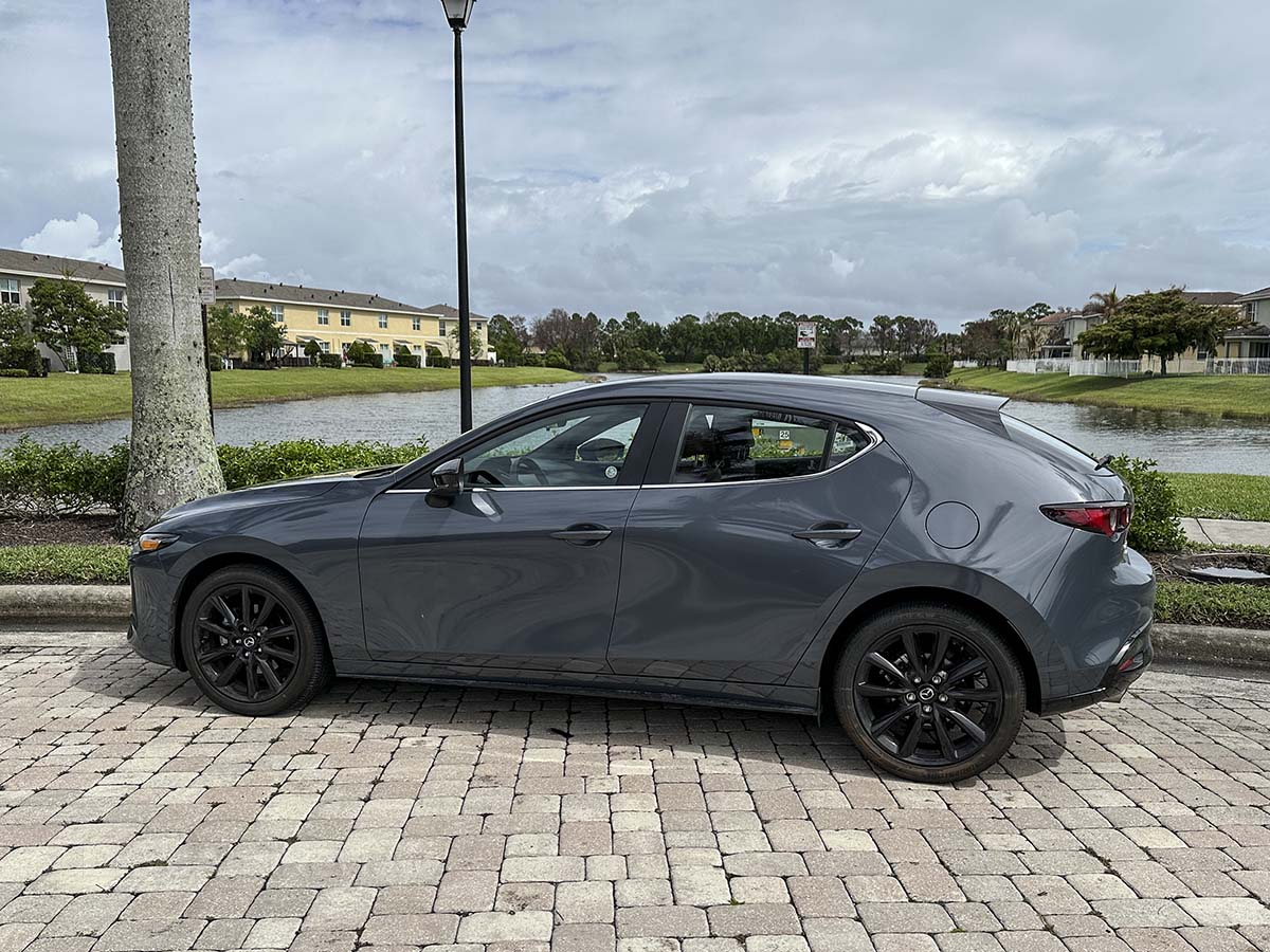 Gray 2026 Mazda 3 with black wheels side view