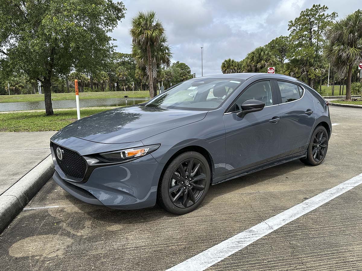 Gray 2026 Mazda 3 front overhang