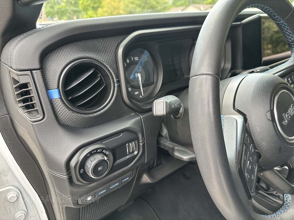 Air vents and lighting control switches in the dashboard of the 2025 Jeep Wrangler Rubicon 4XE 