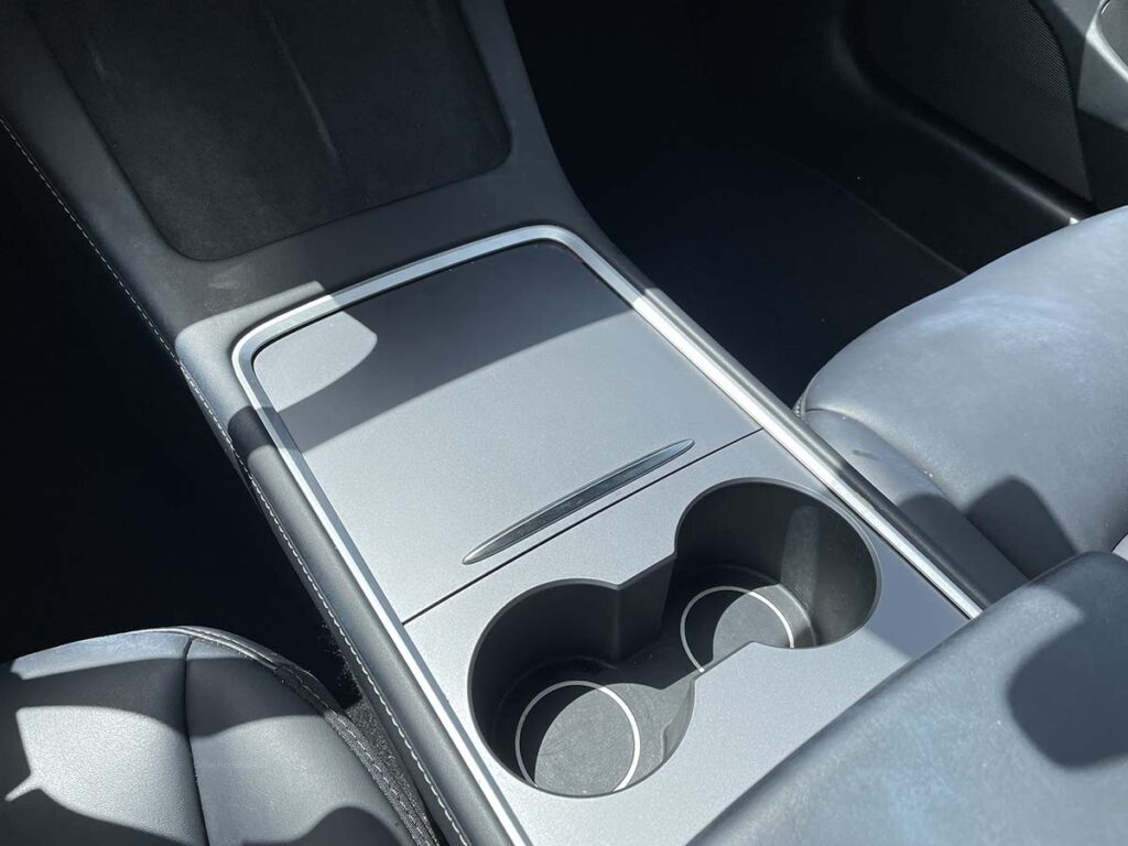 Center console of the Tesla model 3 with dual cupholders