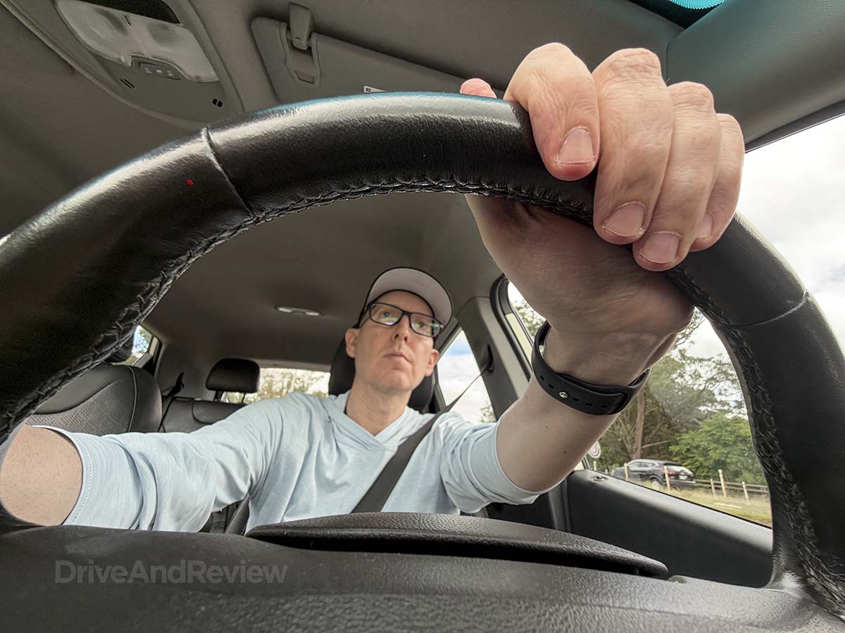 Scott Leazenby behind the wheel of a 2024 Chevrolet Bolt EV