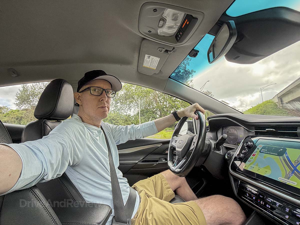 Scott Leazenby driving a 2024 Chevrolet Bolt