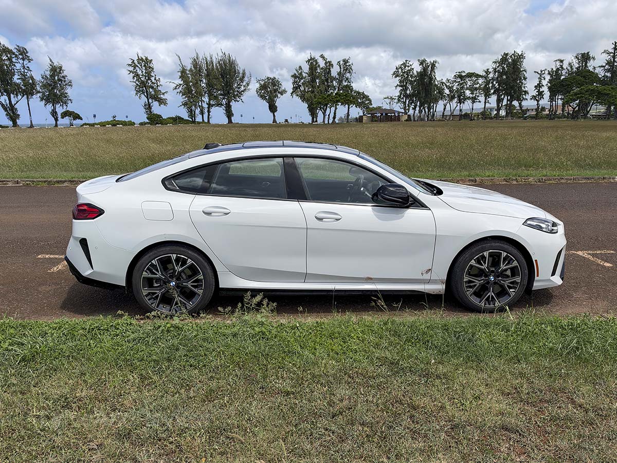 White 2026 BMW 228 xDrive side profile view