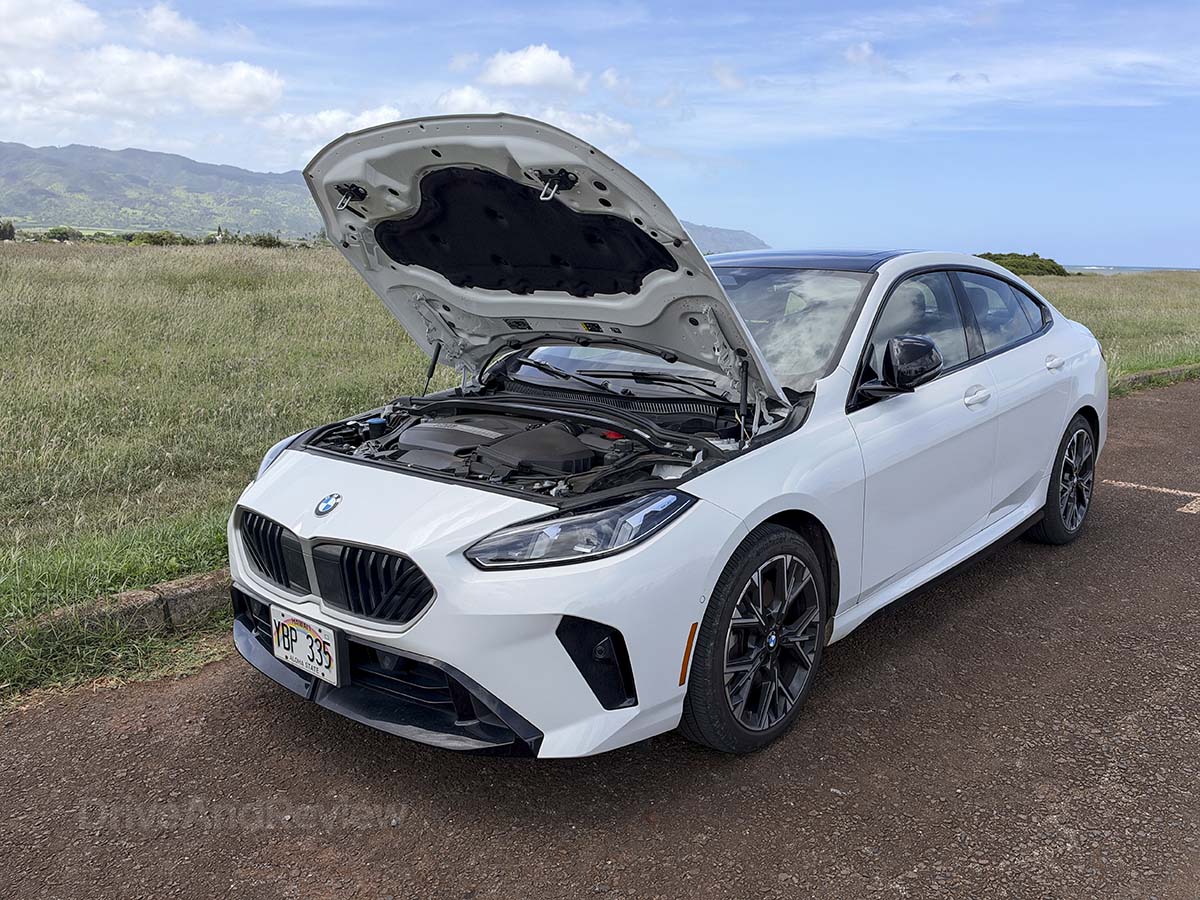 White 2026 BMW 228 with the hood open
