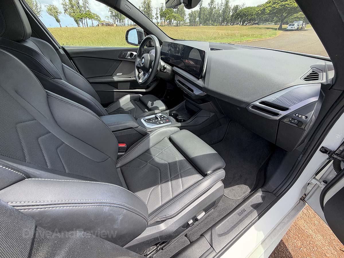 2026 BMW 228 xDrive black interior passenger seat and dashboard