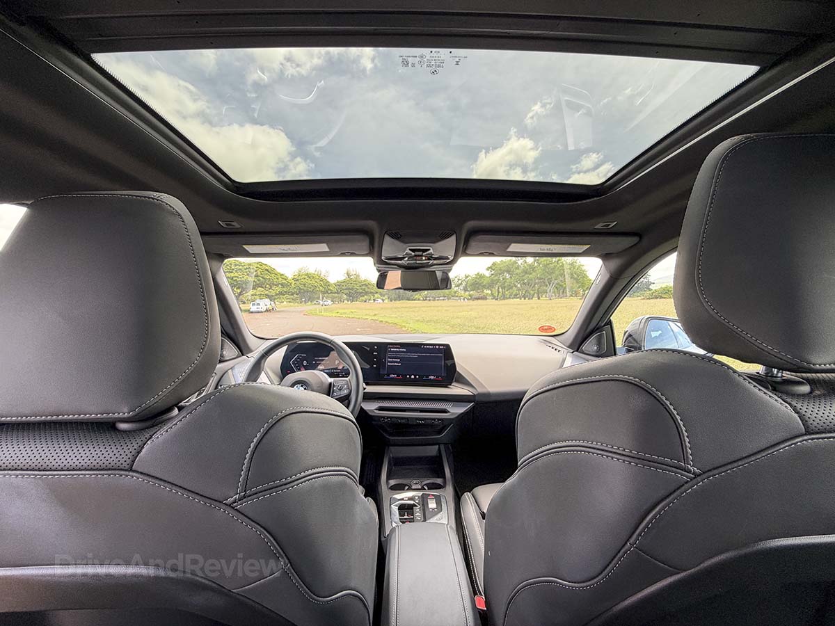 2026 BMW 228 glass roof as a scene from the backseat