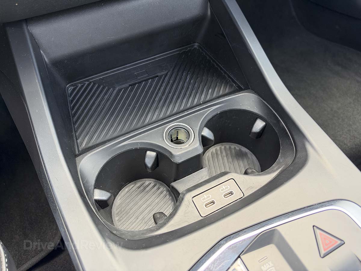 Dual cupholders and wireless charging pad in the 2026 BMW 228