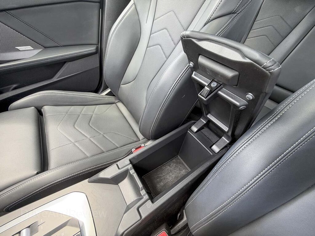 2026 BMW 228 citric console storage space under the armrest